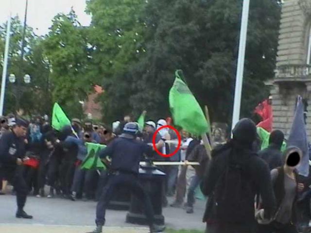Police spray no border march